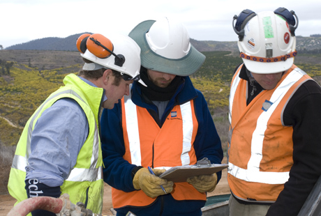 Workers at Enlarged Cotter Dam construction site